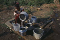 Girl fetching water