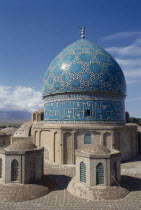 Safavid Cupola. Tomb of the Sufi Dervish Shah Nematollah Vali. Fourteenth Century turquiose and white patterned tiled domed roof