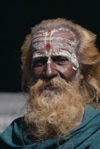 Head and shoulders portrait of a sadhu or holy man.Trichy Tiruchy Tiruchirappalli Calcutta Kolkata