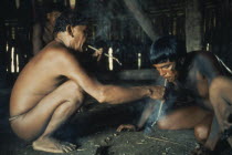 Smoking ritual of Mehinacu men Brasil  Mehinaku Brazil