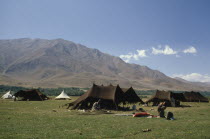 Kurdish nomad encampment in mountainous landscape.Eurasiatent