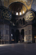 Sultanahmet.  Interior of Haghia Sophia with domed ceiling and decorative mosaic tiled walls.  Former mosque now museum.EurasiaAya Sofya Moslem