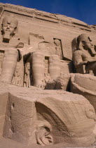 Three of the four giant statues of Ramesses II at the entrance of the Great Temple