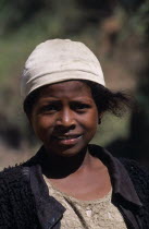 Portrait of a girl wearing a white hat