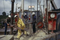 Workers on Shell oil rig.