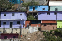 La Planicie community above main highway leaving the colourful hillside town and en route to La Guaira and the national airport   Colorful