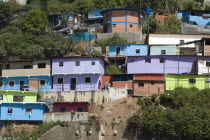 La Planicie community above main highway leaving the colourful hillside town and en route to La Guaira and the national airport   Colorful