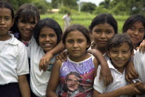 Group of seven smiling girls.