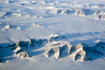 Aerial view at sunset  including snow covered peaks