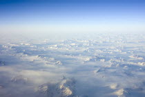 Aerial view at sunset  including snow covered peaks