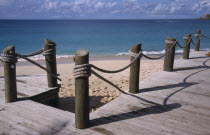 View to the beach and sea from a wooden hotel beach terrace