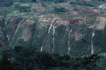 Gully erosion through hillsides.