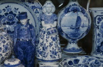 Close up view of a display of delftware in a shop called De Porceleyne Fles.