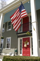 Hancock Inn with large US stars & Stripes flag flying.