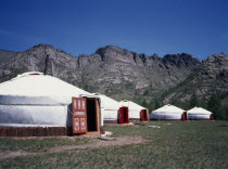 Line of gers near in rocky landscape near Terelj.