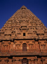 Brihadishwara Temple part view of exterior with carved stonework.