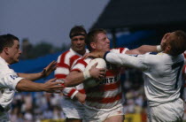 Vicious tackle between two rugby players  Warrington.