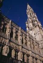 The Grand Place.  Hotel de Ville.  Angled view of exterior facade decorated with statues representing the Dukes and Duchessess of Brabant.