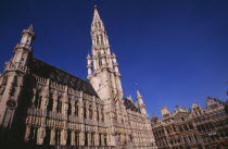 The Grand Place.  Hotel de Ville.  Angled view of exterior facade decorated with statues representing the Dukes and Duchessess of Brabant.