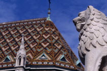 Castle Hill.  Matyas Church  part view of exterior roof and lion statue.Eastern Europe  Matthias Mathias  Eastern Europe  Matthias Mathias