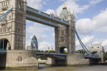 Detail of  Tower Bridge on the River Thames with the Gherkin tower seen through the bridge.United Kingdom  30 St Mary Axe Great Britain UK