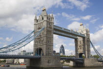 Detail of  Tower Bridge on the River Thames with the Gherkin tower seen through the bridge.United Kingdom  30 St Mary Axe Great Britain UK