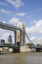 Detail of  Tower Bridge on the River Thames with the Gherkin tower seen through the bridge.United Kingdom  30 St Mary Axe Great Britain UK