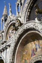 The bronze Horses of St Mark and the 17th Century mosaics on the facade of St Marks Basilica