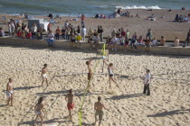 Beach volleyball game on the sands in front of the Grand Hotel.Great Britain United Kingdom