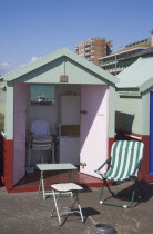 Colourful beach hut interior on the seafront at Hove lawns.Colorful Great Britain United Kingdom