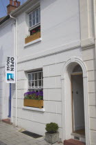 Open house for Brighton fesitval  with colourful flowers in window boxes.Colorful Great Britain United Kingdom