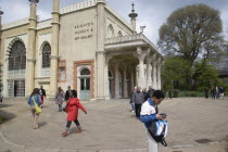 Tourists outside the entrance to the Museum.Great Britain United Kingdom