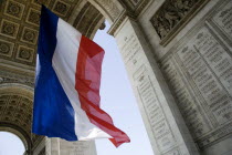 The French Triclour flag flying beneath the central arch of the Arc de TriompheEuropean Western Europe