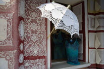 Burano  one of the few inhabited islands in the lagoon famous for traditional lace production. Shop display of locally made lace Store