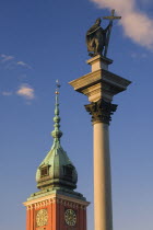 Detail of the Monument to Sigismund III in Plac Zamkowy  Castle Square with the Royal Castle behind with clocks on the tower.TourismTravelHolidaysEastern Europe