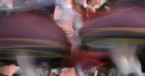 Detail of traditional dancers costumes performing in the Old Town. Moving  blurred skirts.  Eastern EuropeHolidaysTravelTourismColourNational DressMovementColor