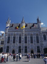 Tourists outside the Stadhius in Burg Square. Flemish Region