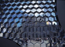 Burg Square with the Stadhuis seen through honeycombe detail of modern sculpture Flemish Region