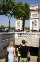 Tourists entering the pedestrian tunnel under the Place de Charles de Gaullle leading to the Arc de TriompheFrench Western Europe European