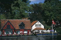 Tivoli Gardens. Colourful cafes and restaurants.Colorful Town Hall Danish Danmark European Northern Europe Scandinavia