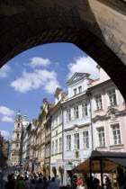 Renaissance and Baroque houses in Bridge Street in the Little Quarter seen through the arch of the Little Quarter Bridge TowerPraha Ceska Eastern Europe European