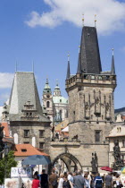 People on the Charles Bridge leading towards the Little Quarter Bridge TowerPraha Ceska Eastern Europe European