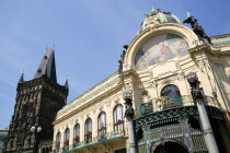 The Art Nouveau Municipal House entrance in The Old Town with the mosaic by Karel Spillar titled Homage To Prague under the Hall dome with the Powder Gate in the distancePraha Ceska Eastern Europe Eu...