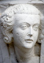 Carving of a female face on a column of the Doges Palace