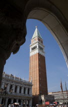 The Campanile tower in Piazza San Marco seen through an arch of the Doges Palace