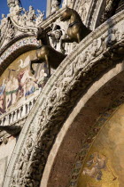 Two of the four bronze Horses of St Mark on the facade of the basilica above the Central Doorway and its 17th Century mosaics