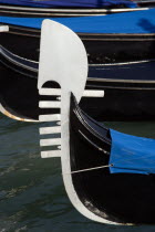 Silver bow  or Ferro  of a gondola moored at the Molo San Marco