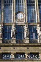 Statues and clock on the facade of the Gare du Nord railway stationEuropean French Western Europe