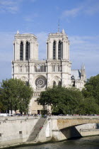 The front of the Gothic medieval Notre Dame cathedral on the Ile De La CiteEuropean French Religion Western Europe