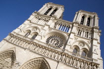 The facade of the Gothic medieval Notre Dame Cathedral on Ile De La CiteEuropean French Religion Western Europe